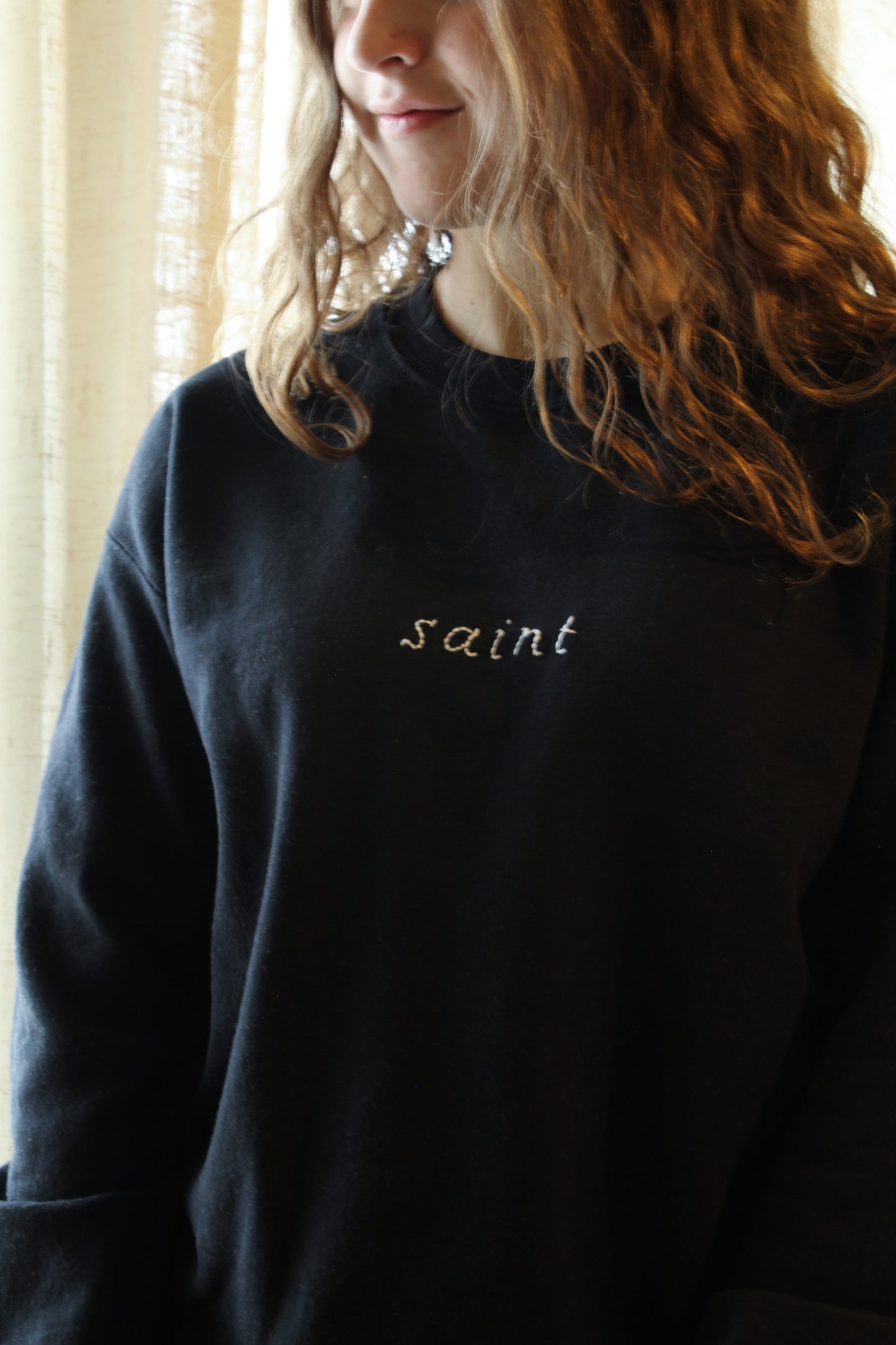 saint crewneck